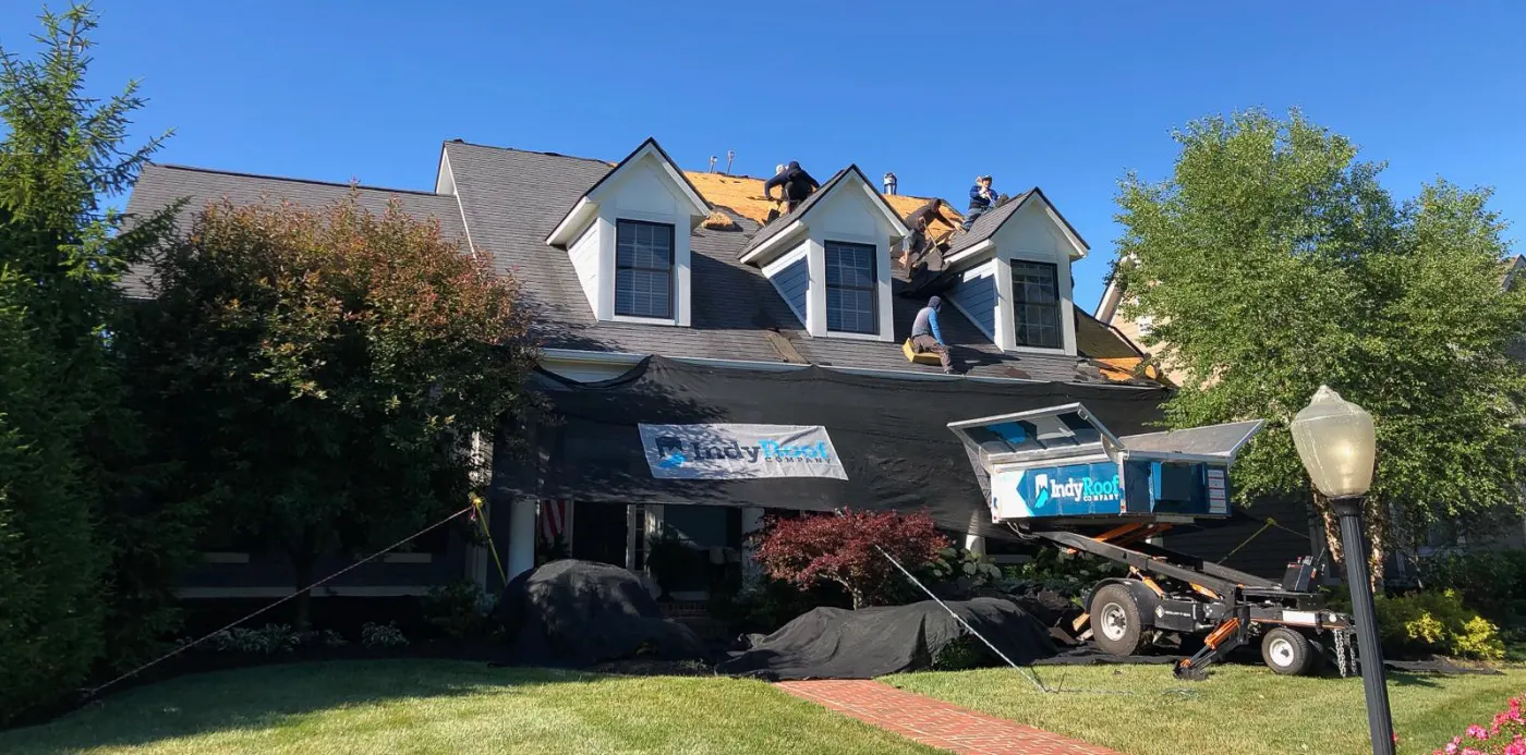 Tarping and dry-in on a Mellott commercial roof